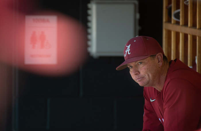 Alabama head coach Brad Bohannon sits on the bench before the game at Sewell-Thomas Stadium Sunday, April 3, 2022. The Crimson Tide defeated Texas A&M 8-4.